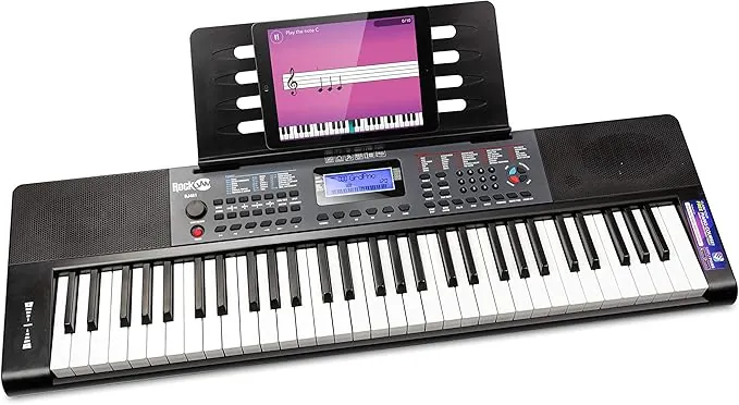 Piano RockJam con teclado de 61 teclas con inflexión de tono, fuente de alimentación, soporte para partituras, pegatinas para notas de piano y lecciones de piano