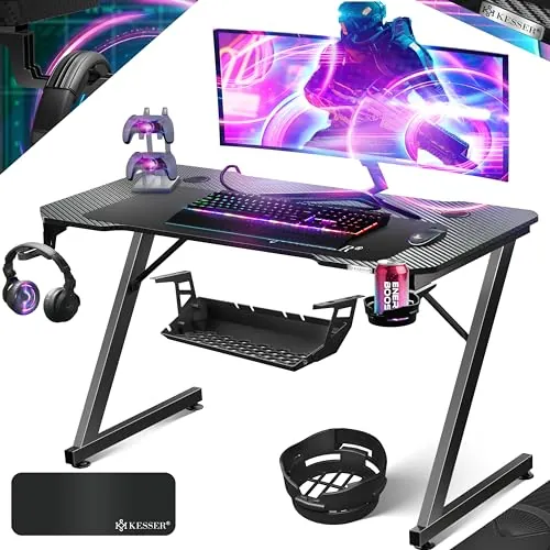 KESSER® Mesa Gaming | 120 x 60 cm | Escritorio para Gamer en Forma de Z | Soporte para Auriculares | Mesa ergonómica para Ordenador | Incl. Alfombrilla de ratón y Soporte