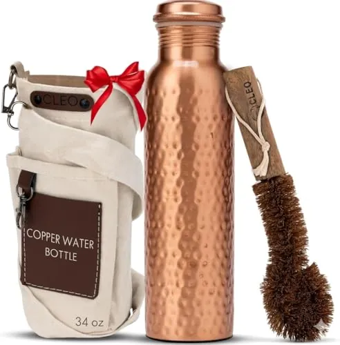 AVA DESIGNZ Botella de Agua de Cobre Puro Martillado a Mano 950 ml – Botella Ayurvédica Antifugas Sin BPA para Yoga, Viajes y Oficina con Bolsa de Lona, Bolsillo, Porta Tarjetas y Cepillo