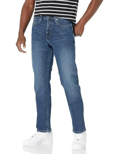 Amazon Essentials Vaqueros Elásticos de Corte Deportivo - colores interrumpidos Hombre, Lavado Medio, 35W / 32L