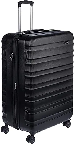 Amazon Basics Maleta Rígida Grande - Equipaje de Viaje Extensible ABS con 4 Ruedas Dobles Giratorias - Resistente a Arañazos y Ligera - 78 x 52,6 x 32cm - Negro