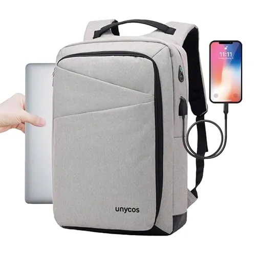 unycos - Mochila 18L para Portátiles y Netbooks de hasta 15,6 Pulgadas, Impermeable, Puerto de Carga USB, Mochila de Hombre y Mujer Ergonómica para Trabajo, Viajes, Colegio y Uso Diario (Gris)