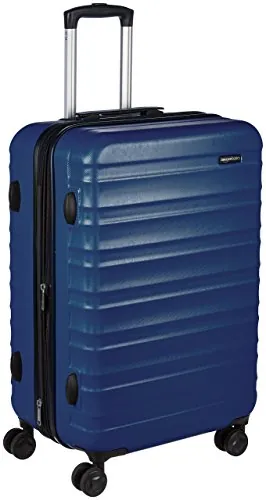 Amazon Basics Maleta Rígida Mediana - Equipaje de Viaje Extensible ABS con 4 Ruedas Dobles Giratorias - Resistente a Arañazos y Ligera - 68 x 45,1 x 28,6cm - Azul Marino