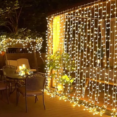 Elegear 6M x 3M Cortina Luces Exterior con Enchufe, Guirnaldas Luz Prolongable, 8 Modos Luz de Cascada para Navidad Natal Boda Fiestas Casa Jardín Patio Balcón Bar, 600 LED, Blanco Cálido